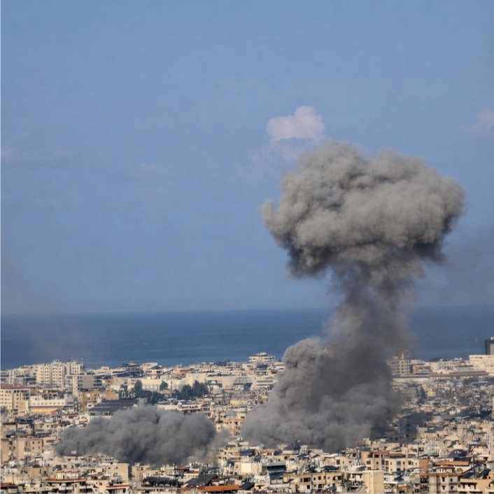 Rooftop view of bombs exploding in Beirut Lebanon - March 2026